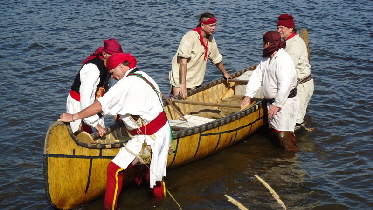 Voyageurs launch canoe